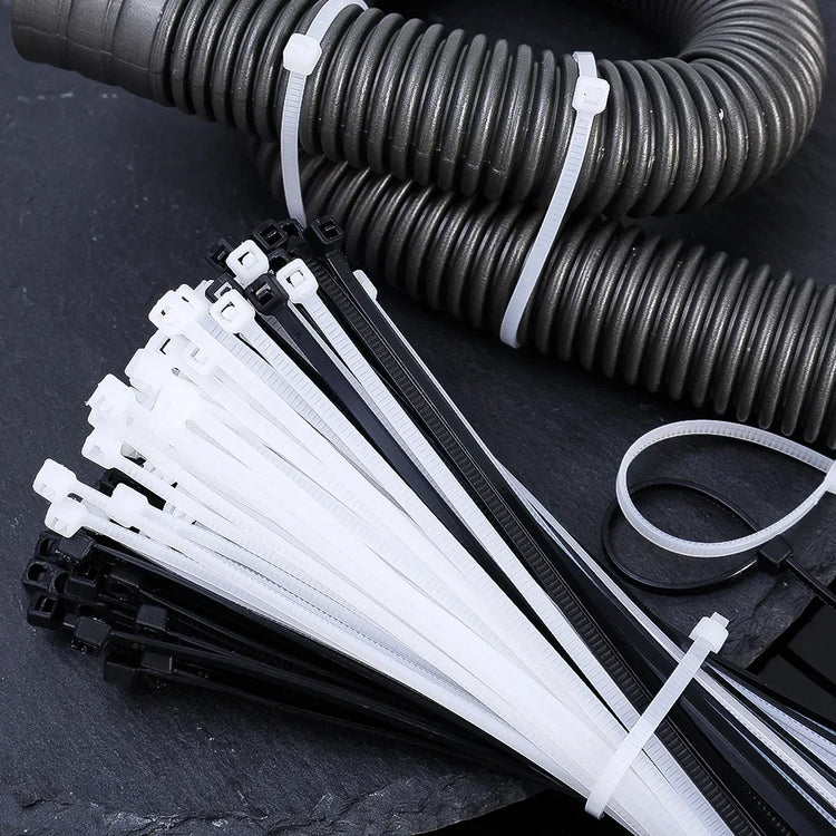 Lot de 100 attaches autobloquantes en nylon, haute résistance jusqu’à 27,2 kg, usage intérieur et extérieur, résistantes aux températures extrêmes, idéales pour organiser câbles, fils, tuyaux, jardin, bricolage, voiture et bureau. Livraison offerte !