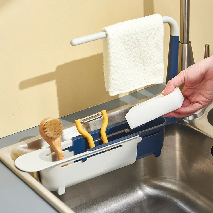 Ingénieux support télescopique pour évier, organisateur 2-en-1, barre à torchon intégrée, design ventilé, installation sans perçage, gain de place et séchage rapide. La livraison prioritaire est offerte !