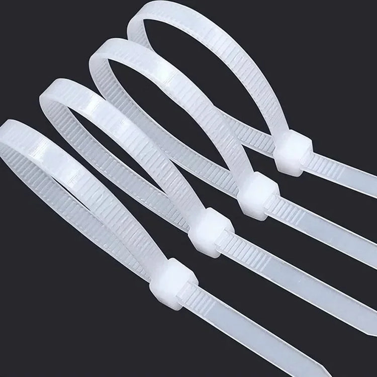 Lot de 100 attaches autobloquantes en nylon, haute résistance jusqu’à 27,2 kg, usage intérieur et extérieur, résistantes aux températures extrêmes, idéales pour organiser câbles, fils, tuyaux, jardin, bricolage, voiture et bureau. Livraison offerte !
