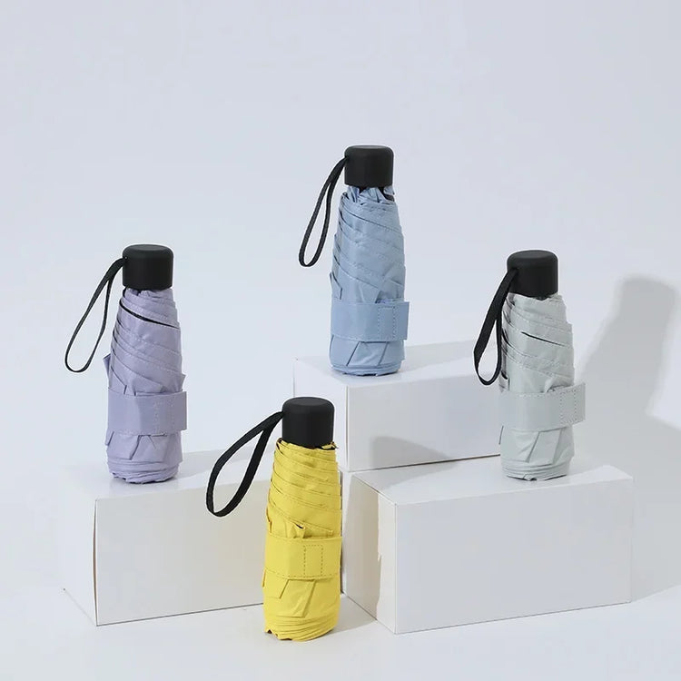 Époustouflant mini parapluie ultra compact et léger – Protection pluie et soleil, anti-vent, pliable, 10 couleurs disponibles, seulement 17 cm. La livraison prioritaire est offerte !