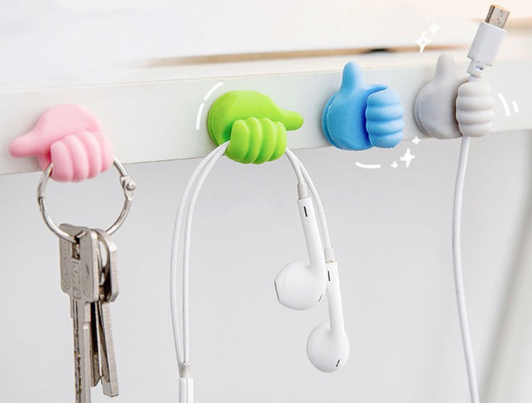 Crochets amusants et pratiques en forme de petites mains, autocollant à forte adhérence, des centaines d’utilisations possibles. La livraison est offerte!