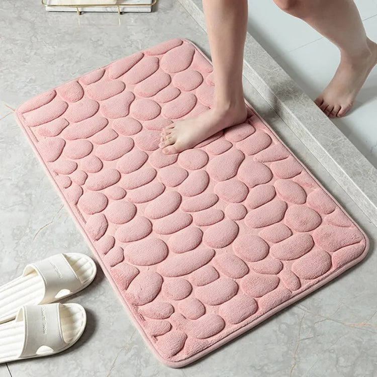 Superbe tapis de bain antidérapant en mousse à mémoire de forme, ultra confortable et douillet, lavable en machine. La livraison est offerte!