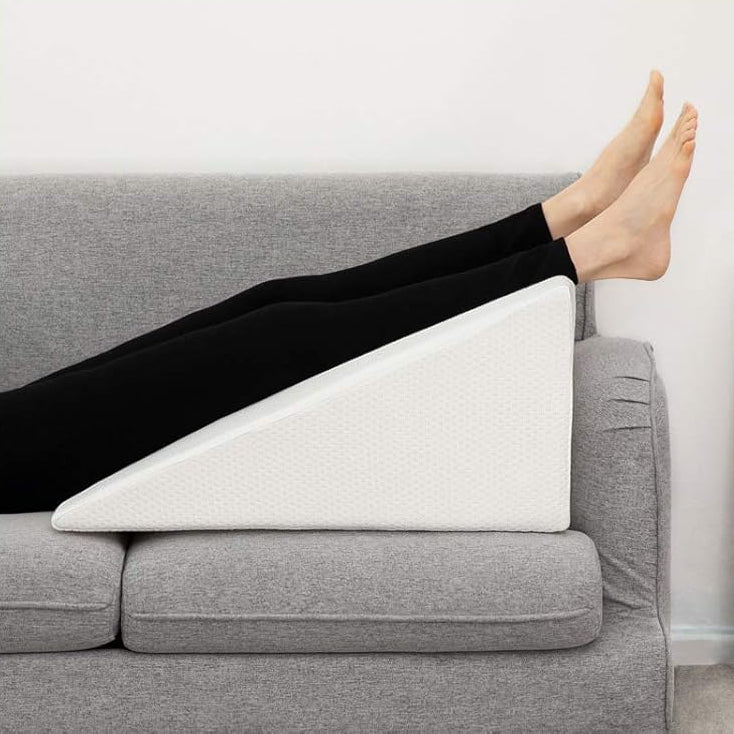 Coussin-triangle 4-en-1  Premium : Soulage efficacement les tensions aux jambes, offre un soutien ergonomique et un confort ultime. La livraison prioritaire est offerte !