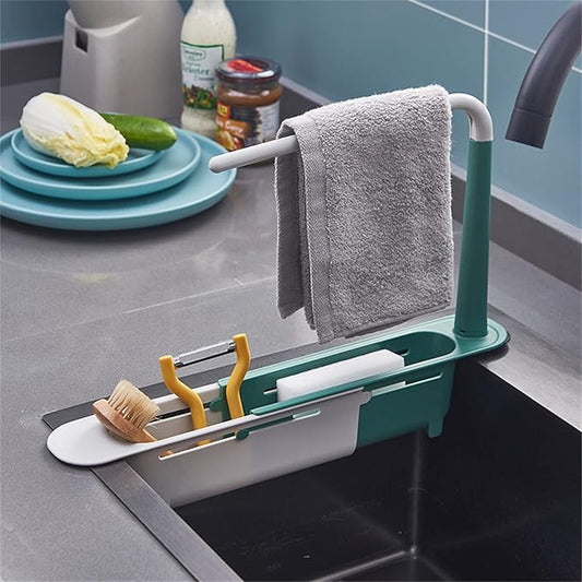 Ingénieux support télescopique pour évier, organisateur 2-en-1, barre à torchon intégrée, design ventilé, installation sans perçage, gain de place et séchage rapide. La livraison prioritaire est offerte !