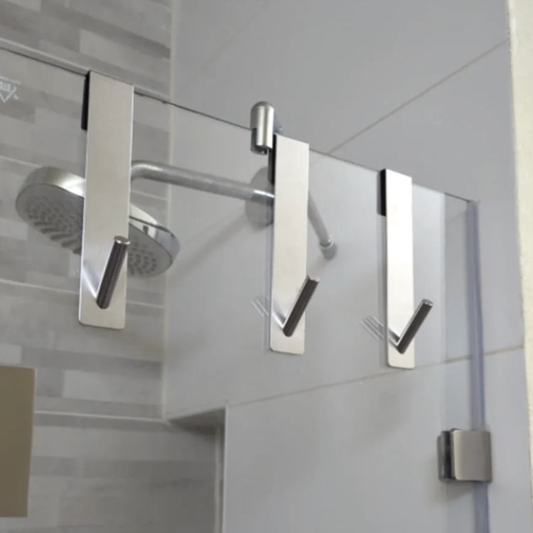 Crochet en acier inoxydable pour porte de douche en verre, installation sans perçage, design moderne antirayures, idéal pour suspendre serviettes, peignoirs et accessoires de salle de bain. Livraison offerte !