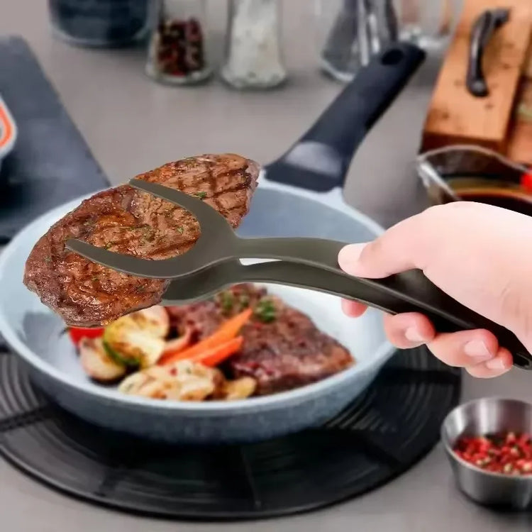 Ingénieuse pince-spatule de cuisine 2 en 1 en nylon résistant à la chaleur 220°C, ustensile multifonction pour œufs, crêpes, steaks, fritures, grillades et poêles antiadhésives. Livraison offerte !