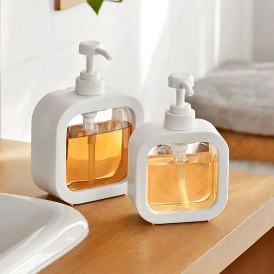 Superbes distributeurs de savon élégants et durables, au design tendance avec un corps transparent et blanc, dotés de pompes anti-fuite robustes, écologiques, réutilisables et polyvalents pour la salle de bain et la cuisine. La livraison est offerte !