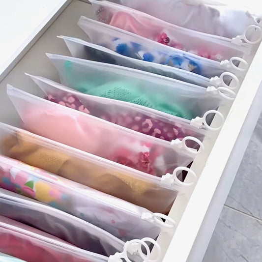 Sacs de rangement transparents avec anneau de traction 23×14 cm, multifonctionnels et étanches, pochettes zippées pour bijoux, cosmétiques, câbles, papeterie et petits articles, réutilisables et portables. Livraison offerte !