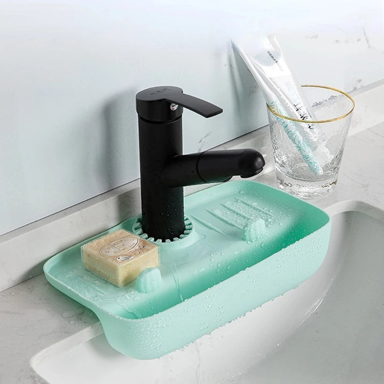 Égouttoir ajustable en silicone pour éponges, savons et brosses, parfait pour cuisines et salles de bain, avec design élégant et hygiénique pour un espace organisé et propre. La livraison prioritaire est offerte !