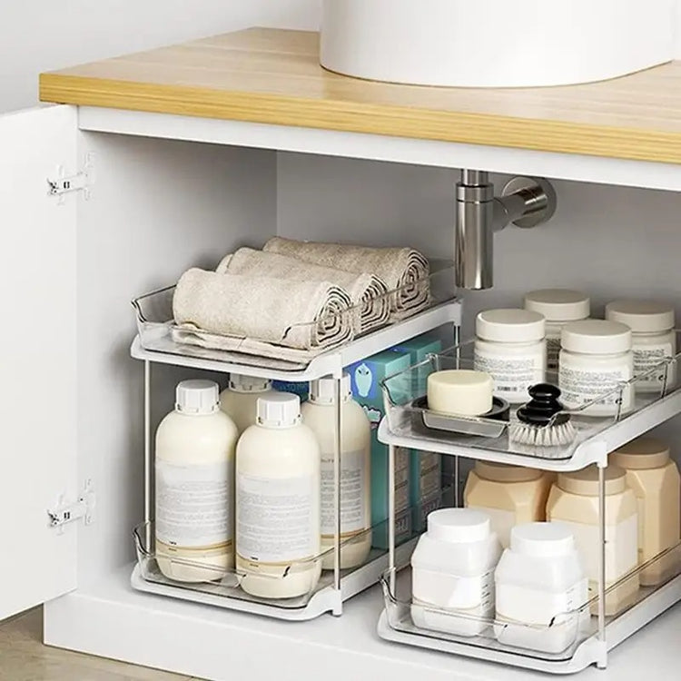 Organisateur sous évier transparent à 2 niveaux avec tiroir coulissant – design élégant, structure inox, grande capacité jusqu’à 8 kg pour rangement cuisine et salle de bain – accès facile, antidérapant et durable. Livraison offerte !