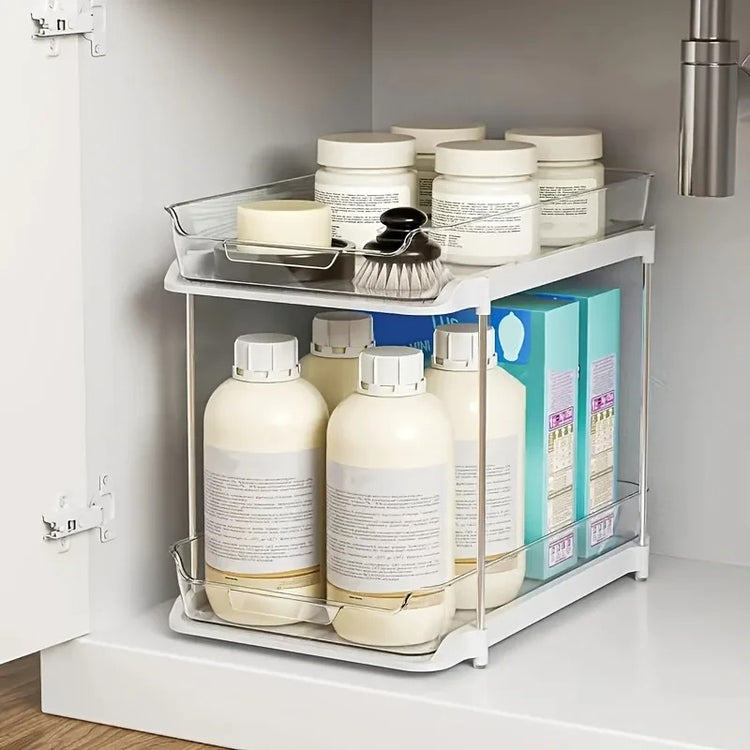 Organisateur sous évier transparent à 2 niveaux avec tiroir coulissant – design élégant, structure inox, grande capacité jusqu’à 8 kg pour rangement cuisine et salle de bain – accès facile, antidérapant et durable. Livraison offerte !